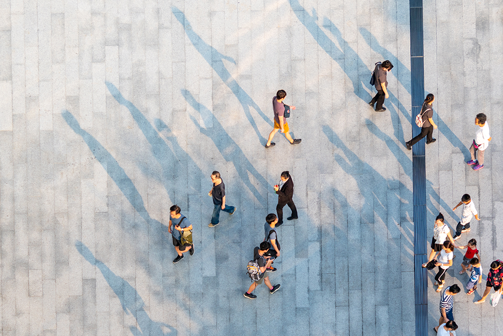 aerial view of people walking aerial view of people walking